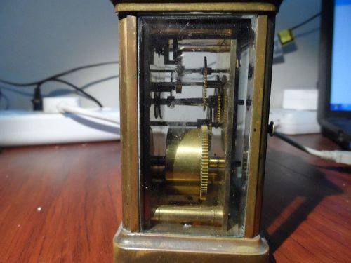 carriage clock. with case