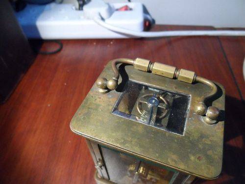 carriage clock. with case