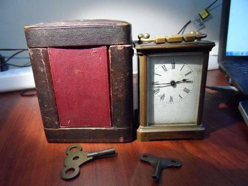 carriage clock. with case