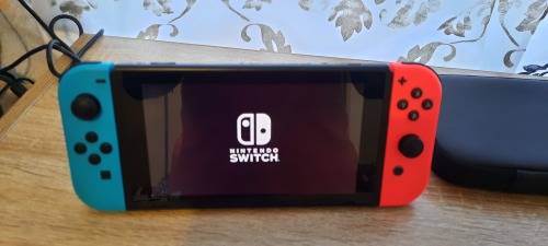 Nintendo Switch Console Gen 1 Neon Blue Red and Carry Case and Original Accessories