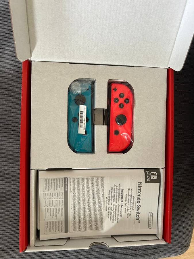 Nintendo Switch V2 Neon Red / Neon Blue + 1 Game + Case