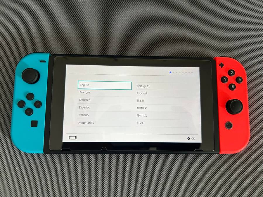 Nintendo Switch V2 Neon Red / Neon Blue + 1 Game + Case