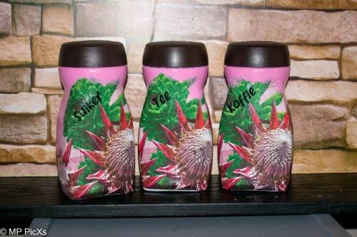 Coffee, Tea and Sugar cannisters (Afrikaans) Rounded jars with Protea