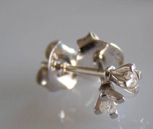 DIAMOND STUD EARRING - 0.03 CARAT EACH - SET INTO SILVER