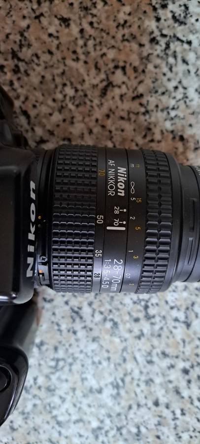 Nikon Camera F90 + Nikon AF Nikkor Lens 28 - 70 mm 1 : 35 - 4.5D - Nikon Speedlight Flash SB -25