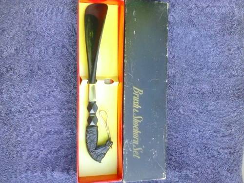 Vintage shoe horn with handle shaped like a horse's head, original box
