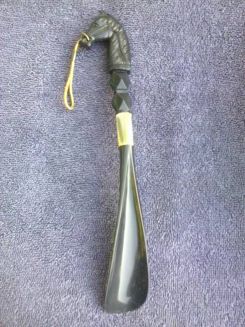 Vintage shoe horn with handle shaped like a horse's head, original box