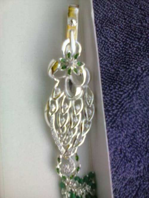 Silver coloured metal keyring with green beads, new in box - never used, 13.5cm long
