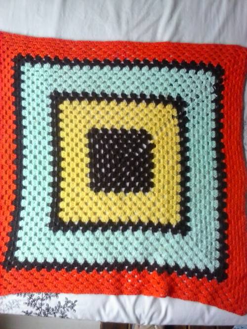 Crochet throw brown/ orange, used in good condition, approximately 71cm x 71 cm