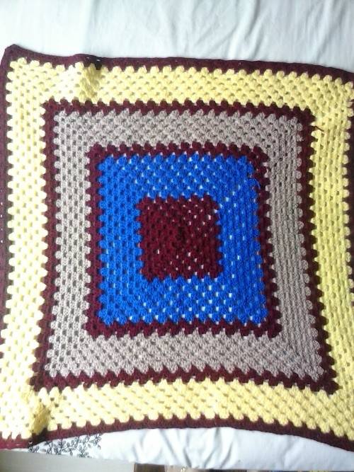 Crochet throw maroon/ yellow, used in good condition, approximately 71cm x 71 cm