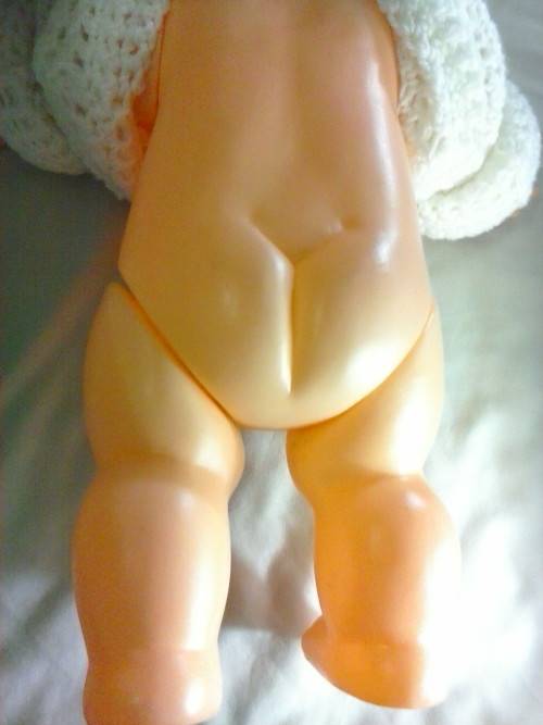 Large Kewpie doll, about 50cm tall, moving arms, legs and head.