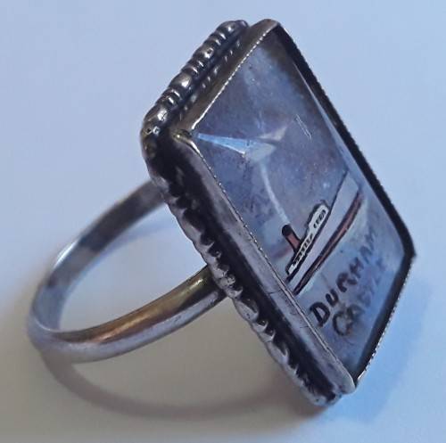 A vintage solid silver and enamel `Durham Castle` ring.
