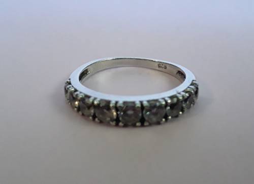 Solid sterling silver half eternity ring with clear stones