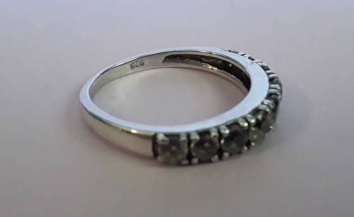 Solid sterling silver half eternity ring with clear stones