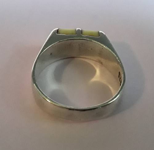 Solid sterling silver ring with lovely cream coloured stones