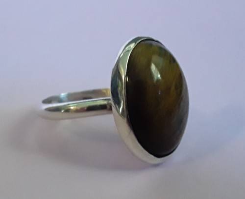 Silver ring with lovely large stone.  Adjustable band
