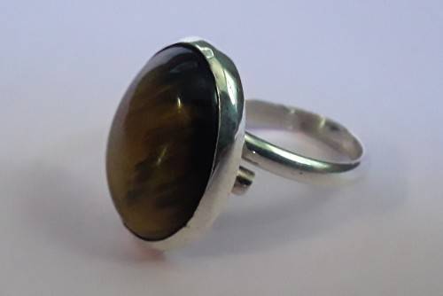 Silver ring with lovely large stone.  Adjustable band