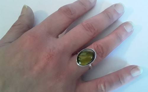 Silver ring with lovely large stone.  Adjustable band