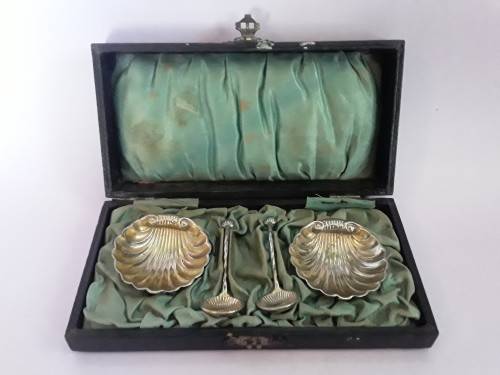 Early Pair of Cased Silver Plate Shell-Shaped Footed Salts and Spoons.