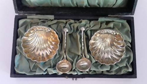Early Pair of Cased Silver Plate Shell-Shaped Footed Salts and Spoons.