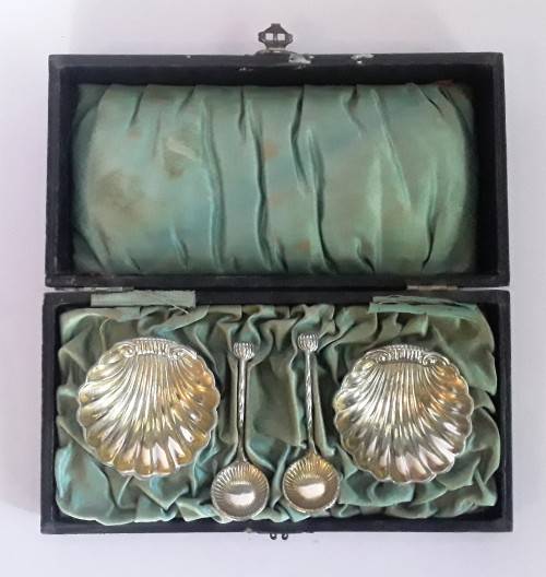Early Pair of Cased Silver Plate Shell-Shaped Footed Salts and Spoons.