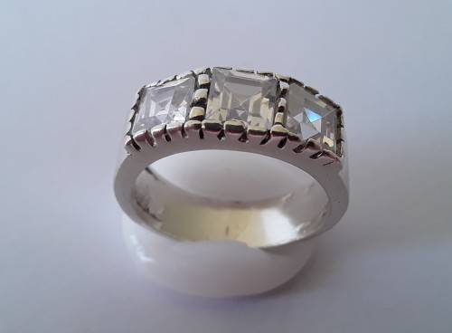 Solid sterling silver ring with three clear, faceted stones.  Size N.  4.6g