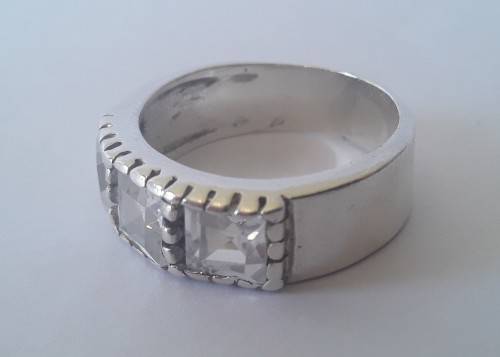 Solid sterling silver ring with three clear, faceted stones.  Size N.  4.6g