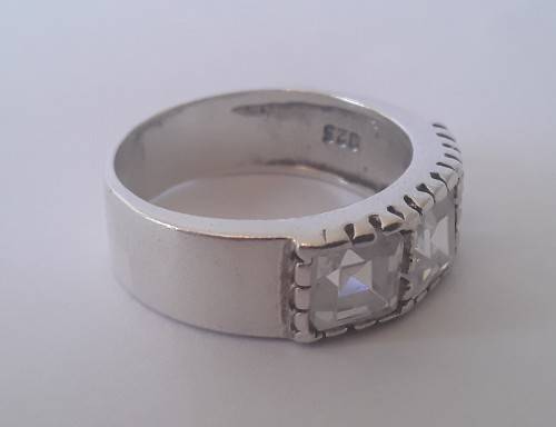 Solid sterling silver ring with three clear, faceted stones.  Size N.  4.6g