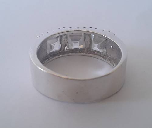 Solid sterling silver ring with three clear, faceted stones.  Size N.  4.6g