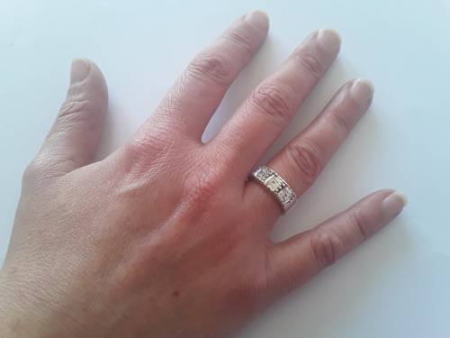 Solid sterling silver ring with three clear, faceted stones.  Size N.  4.6g