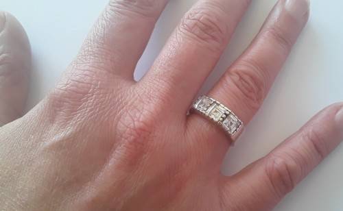 Solid sterling silver ring with three clear, faceted stones.  Size N.  4.6g