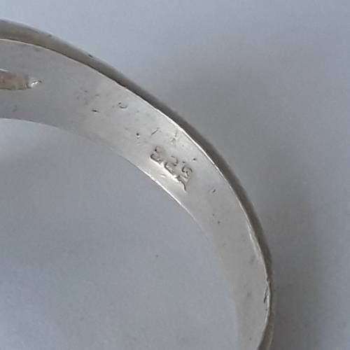 925 Solid silver pointer ring with ruby coloured stones. Size: K1/2 (16.1mm)