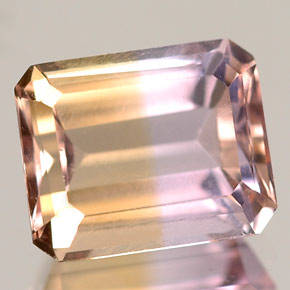 Natural Mined Ametrine 6.1mm X 4.1mm  0.65cts