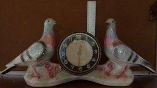 VINTAGE ART DECO ERA?LARGE ORNAMENTAL PIGEON CLOCK.