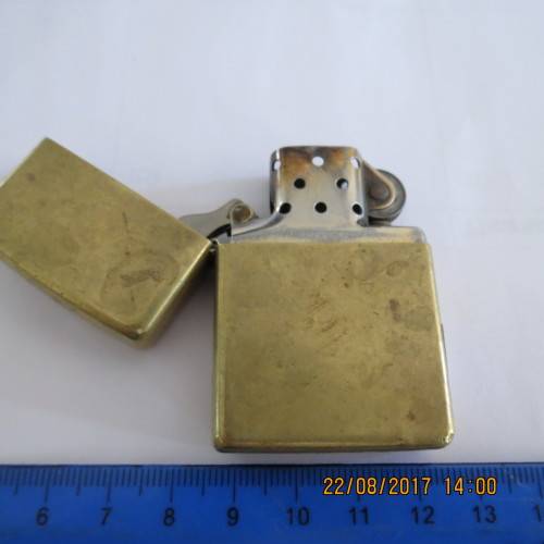 Zippo lighter marked solid brass, as per photo