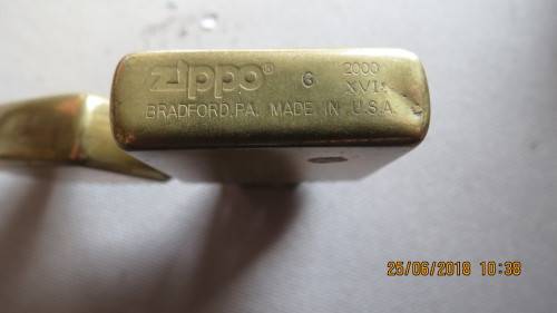 Zippo lighter marked solid brass, pin on flap replaced with piece of wire,  as per photo