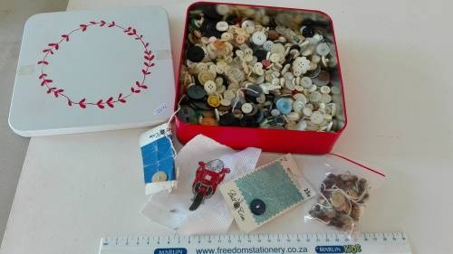 tin of buttons, 19cm by 19cm and 4,5cm deep, as per photo