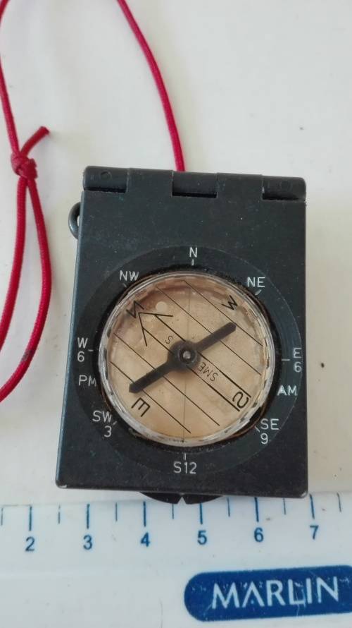 interesting handheld compass, opens up, has mirror.............,as per photo