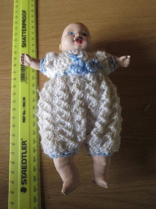 porcelain dummy doll with hand crochet clothes, as per photo