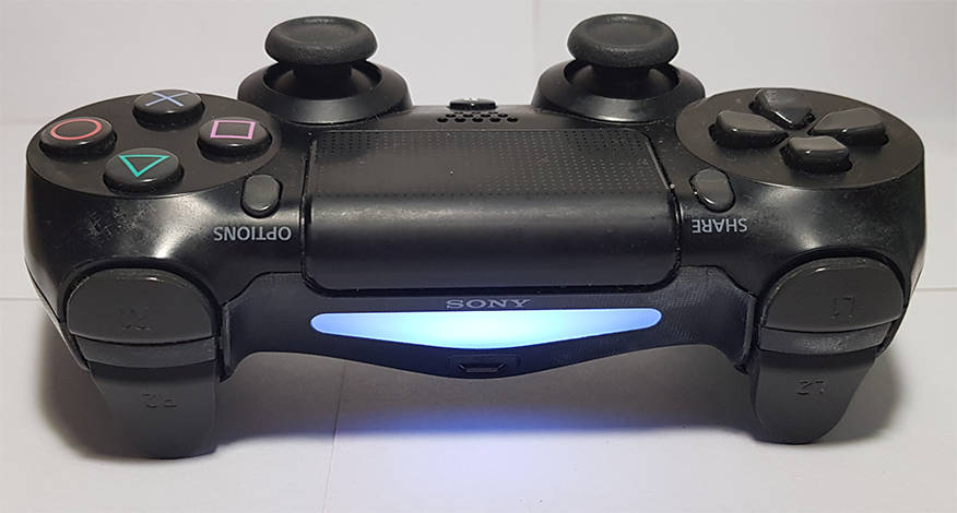 PlayStation 4 Gen1 Console + 1 V2 PS4 Controller + Fortnite (preloaded) or Apex Legends + 5 PS4Games