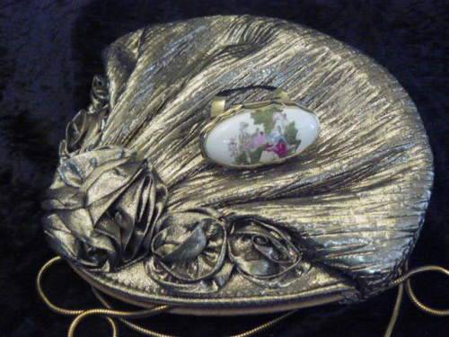 CLUTCH BAG AND LIPSTICK HOLDER