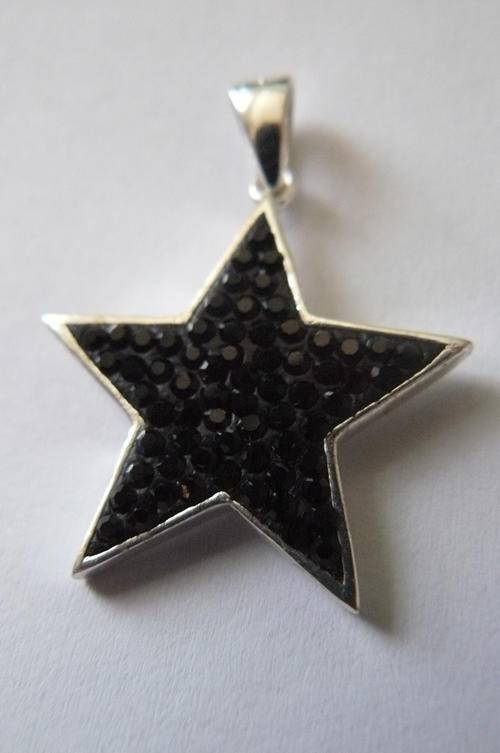 SILVER STAR PENDANT STAMPED WITH SOME BLACK BLING