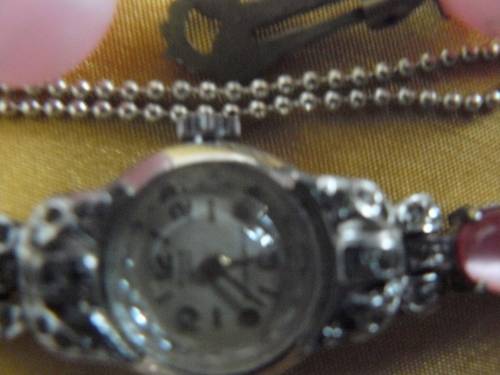 WATCH WITH PENDANT ON CHAIN AND CLIP ON EARRINGS LOT