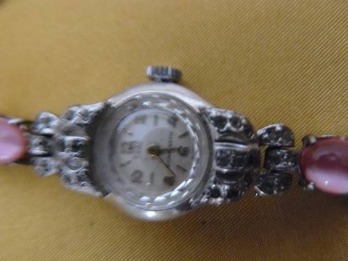 WATCH WITH PENDANT ON CHAIN AND CLIP ON EARRINGS LOT