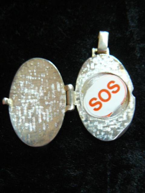 SOS SILVER TONED LOCKET - PENDANT
