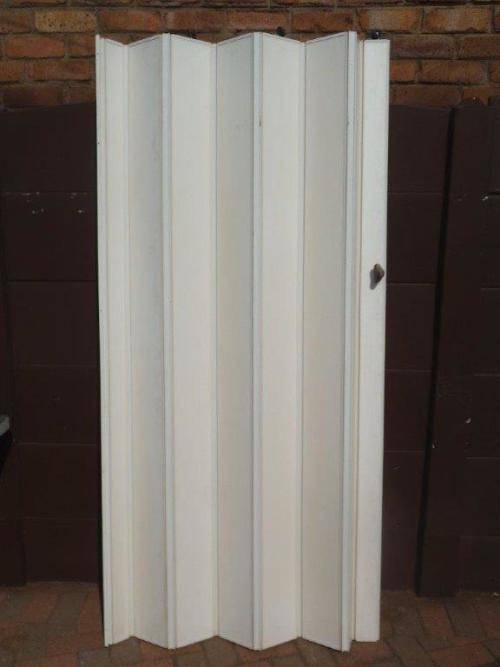 WHITE INTERIOR FOLDING DOOR