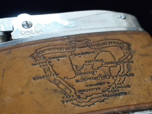 Omega engraved lighter