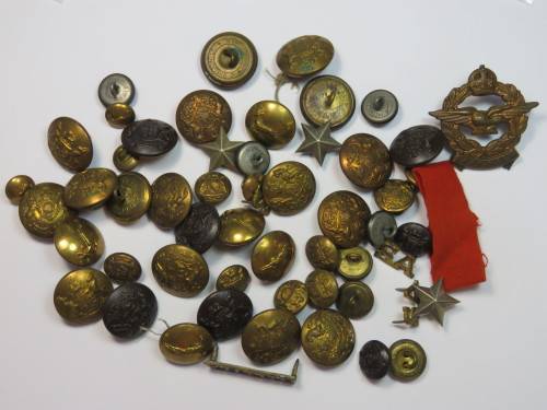 Lot of military buttons and badges