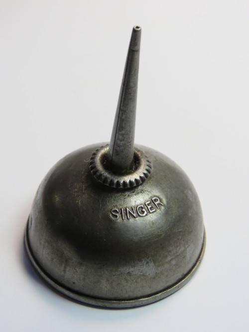 Small antiques Singer oil can