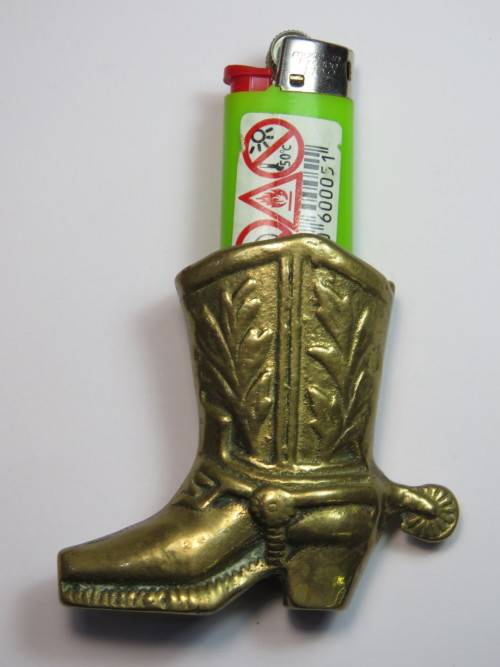 Vintage brass cowboy boot lighter holder